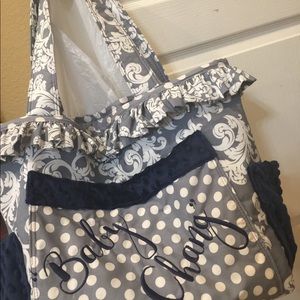 This diaper bag is totally your custom. Colors and name on outside pocket